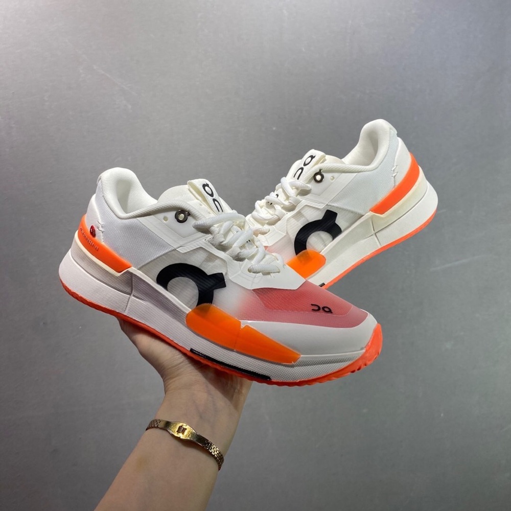On Running Women's Sneakers in White and Orange